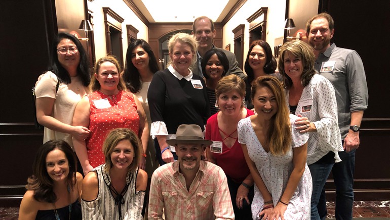 Pictured before Jack White’s performance at the 2018 NALCP conference are: (standing): Chipotle Mexican Grill’s Kim Oganesyan, Speedway LLC’s Jennifer Blessing, Live Nation’s Asally Adib-Samadian, Darden Restaurants’ Colleen Hunter, BMI’s Dan Spears, Starbucks’ Robin Howard, NALCP Board Member Becky McKeithan, Red Robin’s Amanda Black, Craftworks Restaurants’ Courtney Mowry and Whole Foods’ Ryan Bissett. (Kneeling): Dave & Busters’ Jill Valachovic, Bowlmor AMF’s Portia Bagby, BMI songwriter Jason White and Sprouts Farmers Market’s Tina Redfern.